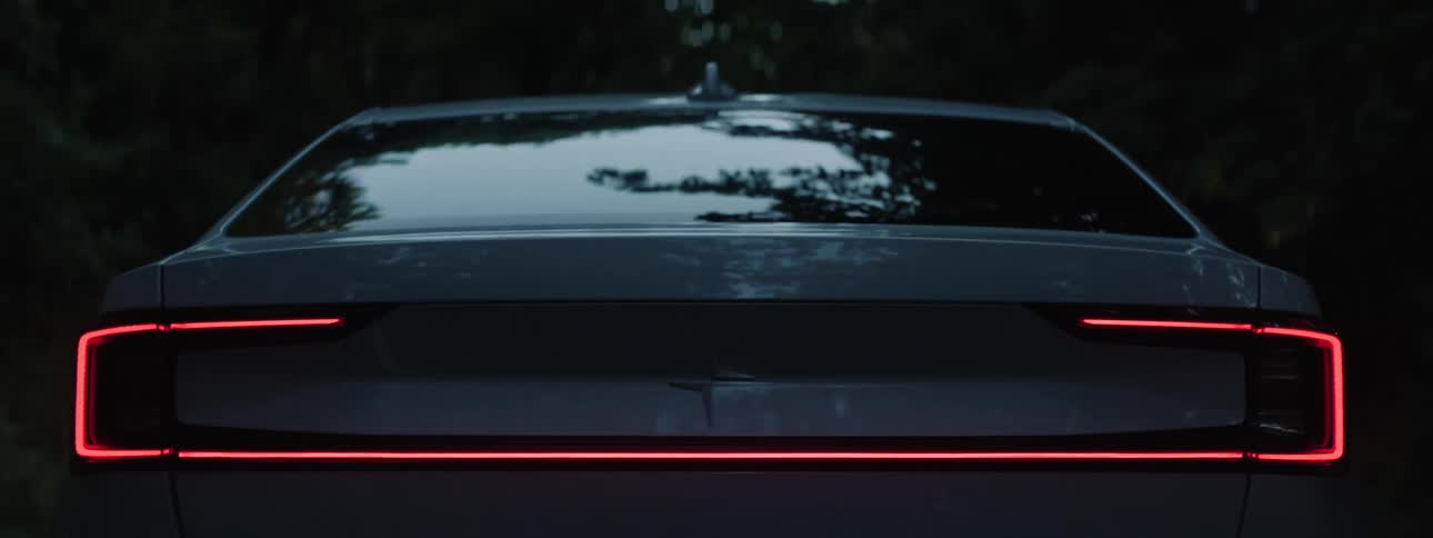 A Polestar Electric Vehicle drives down a road