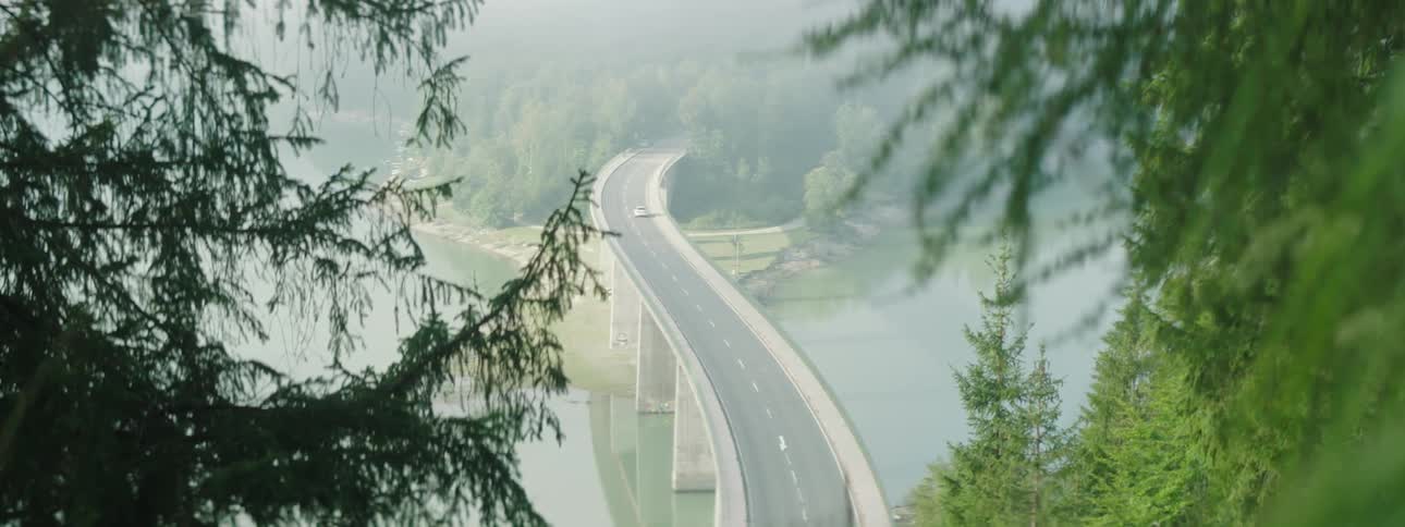 Landscape of a car moving on the bridge on a sunny day