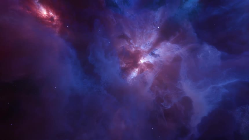 Colorful clouds of a nebula move among the stars across outer space