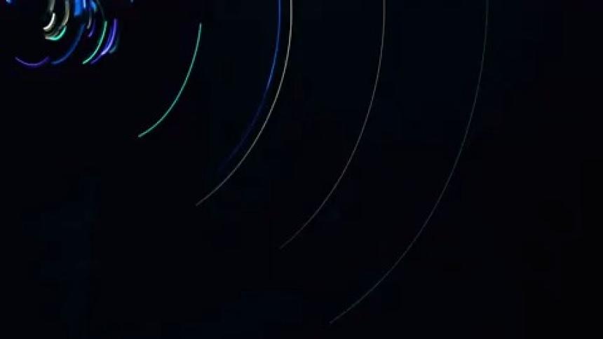 Neon lights in orbit motion on a black background