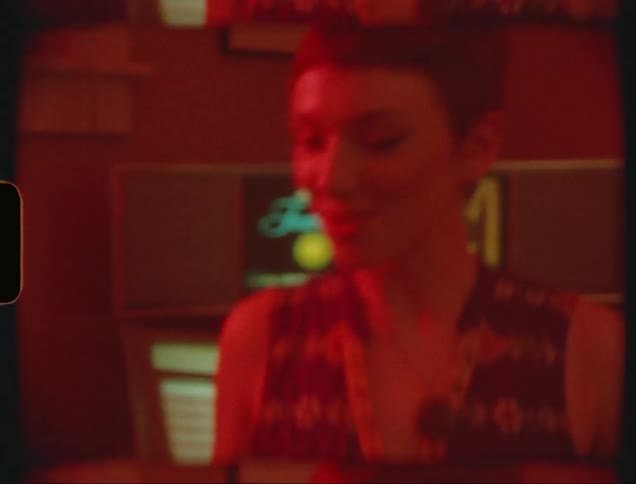 Cheerful woman dancing in a disco