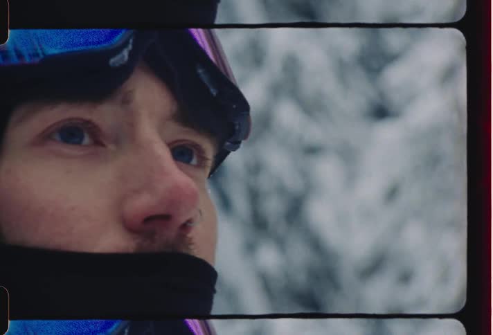 Close up of a person wearing winter protective gear looking around