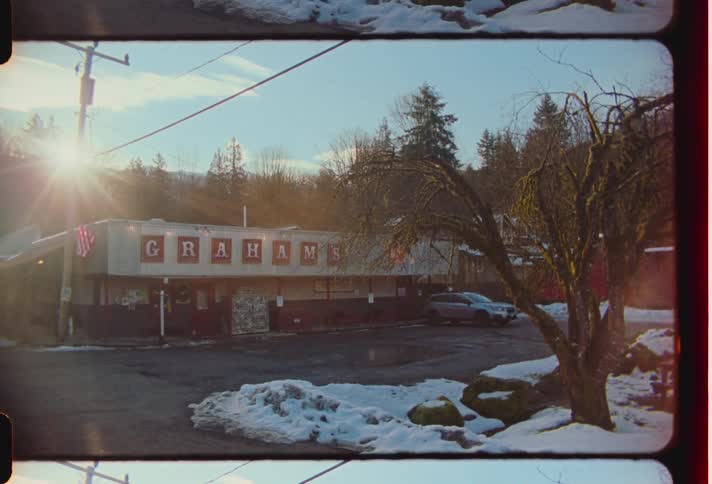The sun is shining over the store