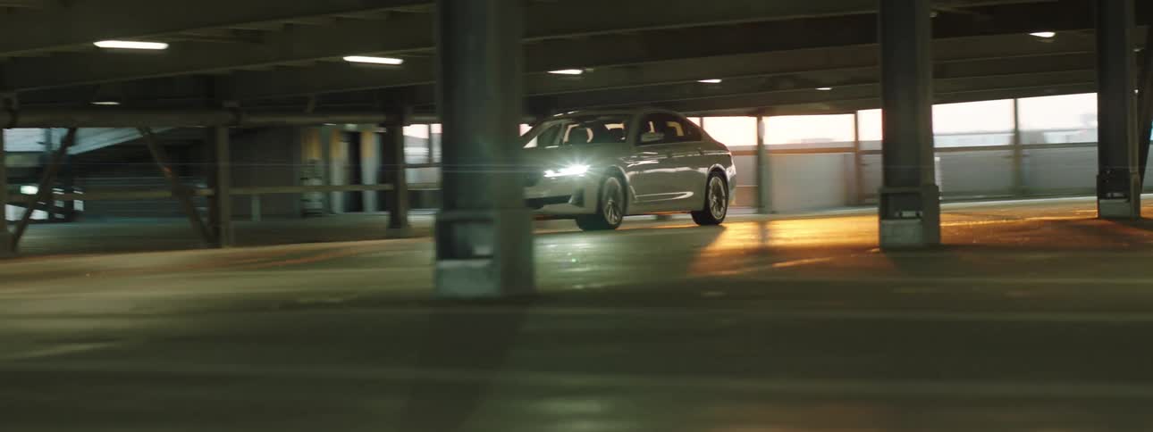 A car driving in a parking lot