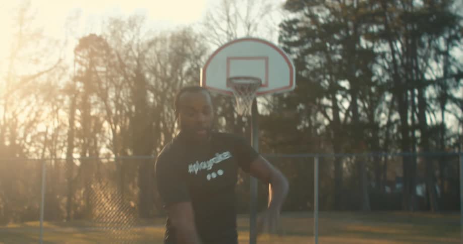 A footage of a basketball player in a community court