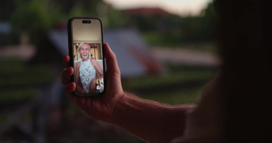 Happy woman talking on a video call on a smartphone