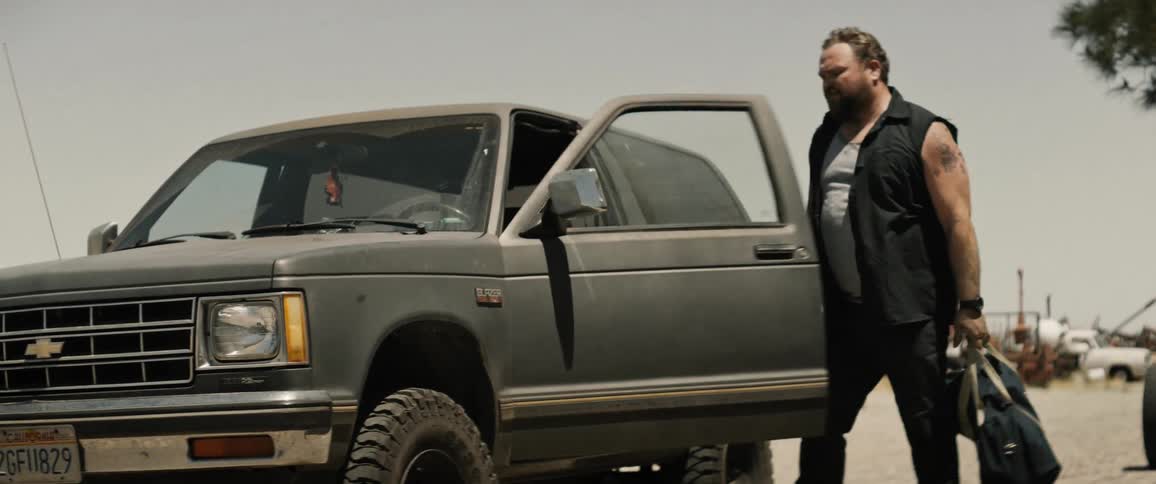 Father and his young son getting into the truck