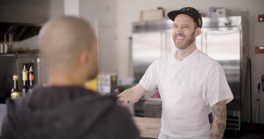 A clip of two men having a conversation