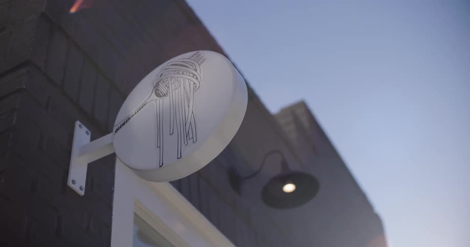 Logo of a fork with noodles from a restaurant