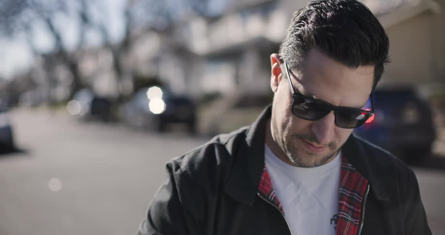 Portrait of a man wearing sunglasses outdoors