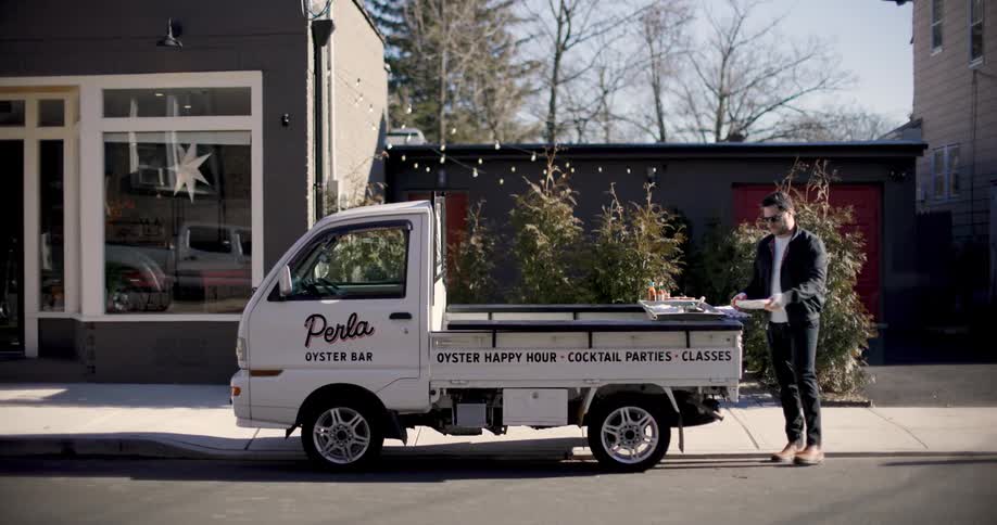 A clip of a man working on a truck