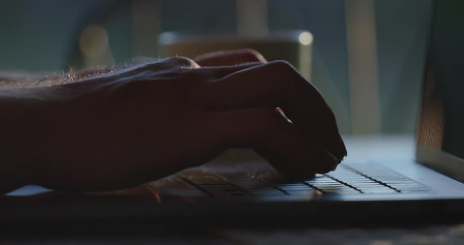 A clip of a person typing on a pc