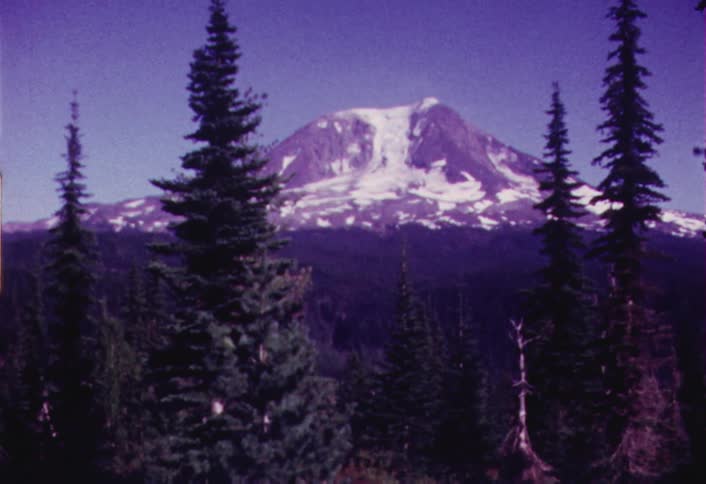 Large mountain partially covered in snow