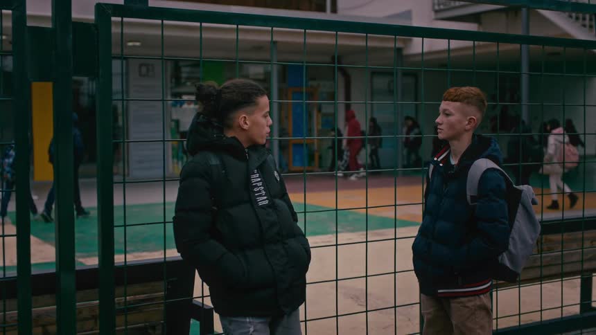 Kids entering school from the school yard