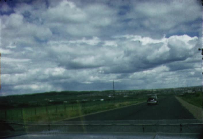 Greenland in the hills as seen through a moving windshield on a very cloudy day
