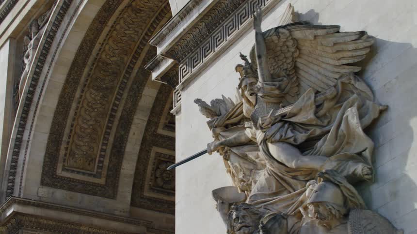 An orbiting clip of a statue on an arc tower