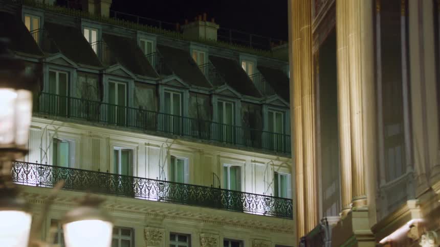 Apartment buildings in a city at night