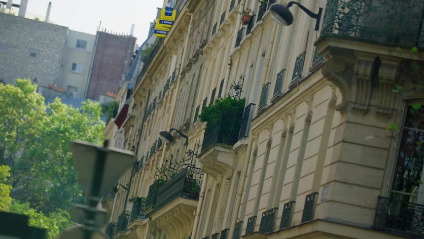Residential buildings in the middle of an alley in a metropolis