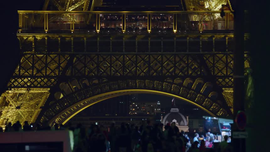 A night footage of a concert under the paris tower