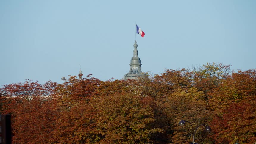 A clip of a tower with france flag on it