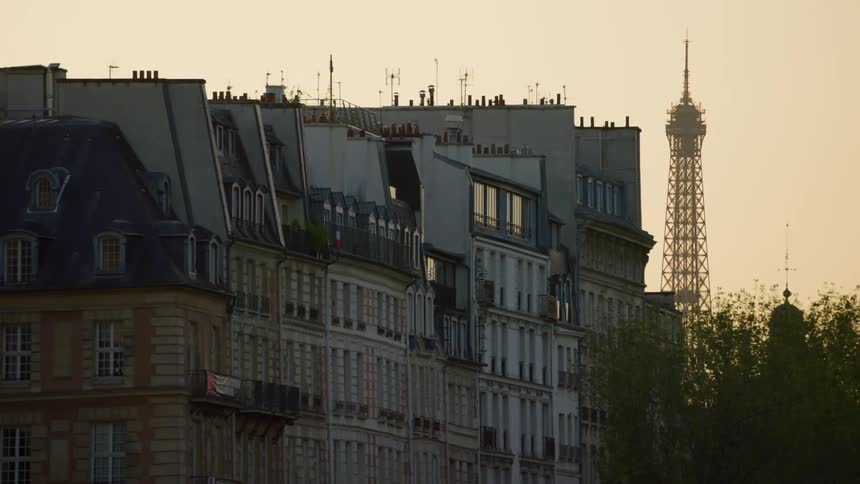 A clip of a building beside a tower