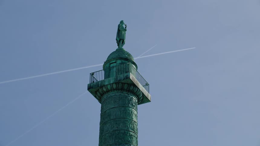 Monument of a pillar in a cloudless blue sky