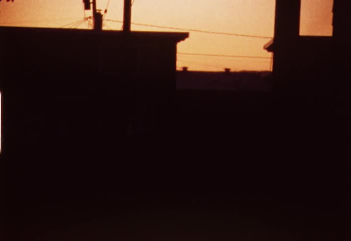 Buildings are shaded completely dark at dawn