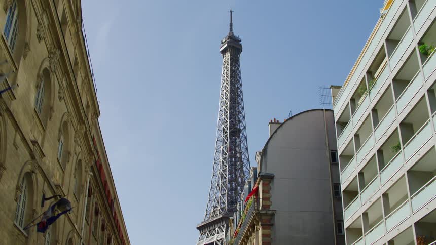 A paris street with a view of the eiffel tower