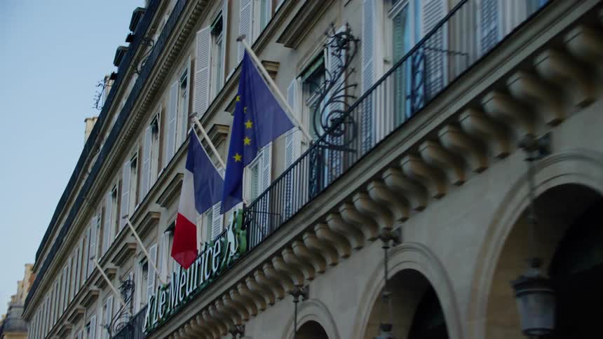 Flag of france and the european union on a residential building