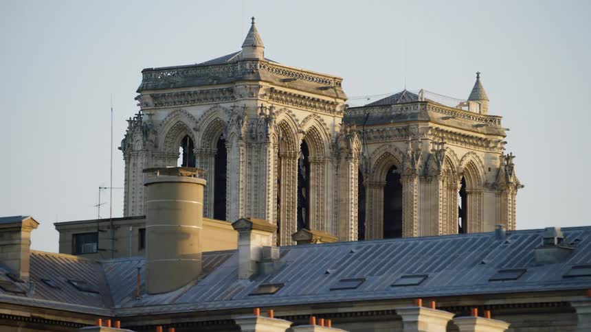 A large old beige tourist building with small towers on top