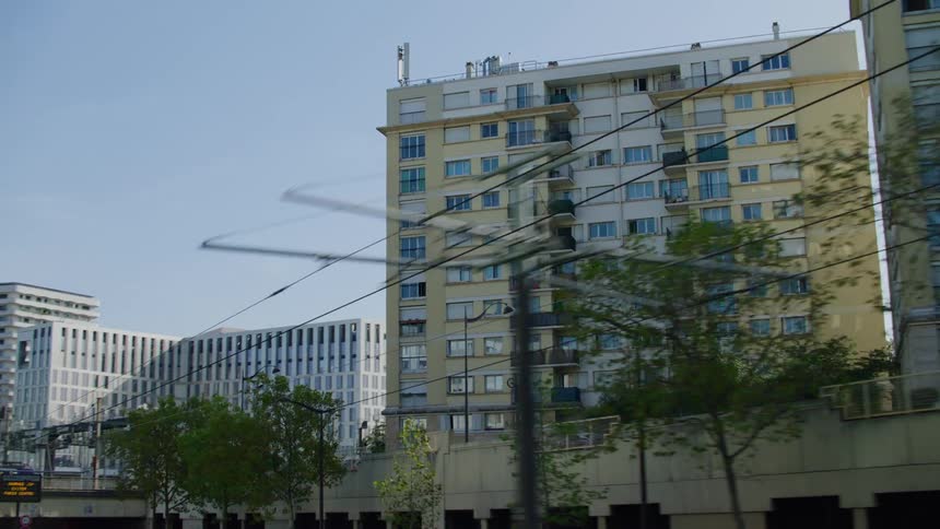 A view of a building outdoors in a large city