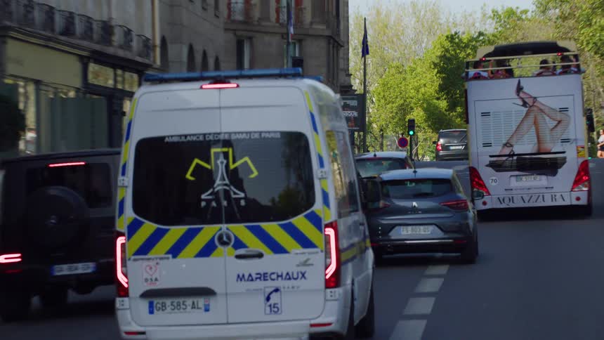 Ambulance speeding through the streets of france