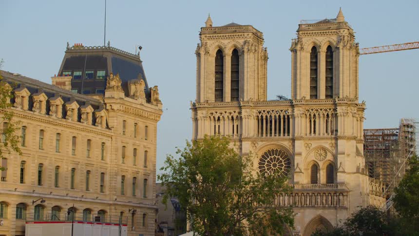 Notre dame cathedral in france in paris on a cloudless blue sky day