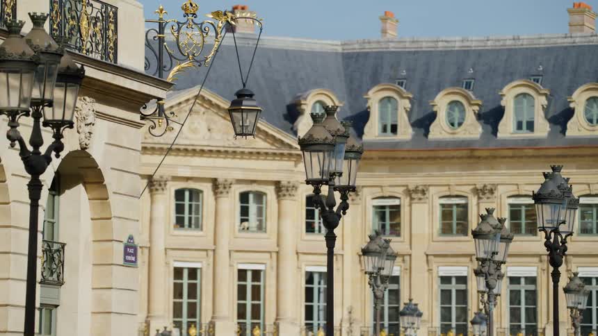 Lamp posts line the large building