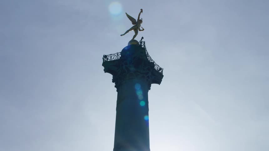 Artistic pillar with the golden angel at the tip