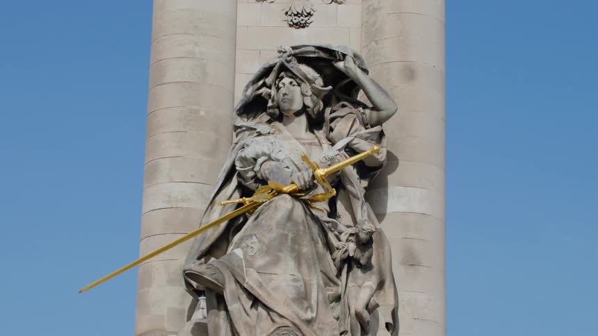 A statue of a woman is on display