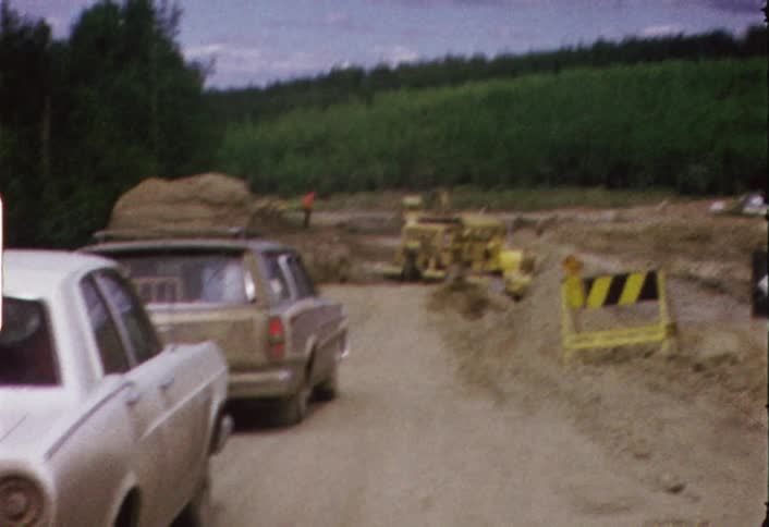 Vehicles stopped at a detour site