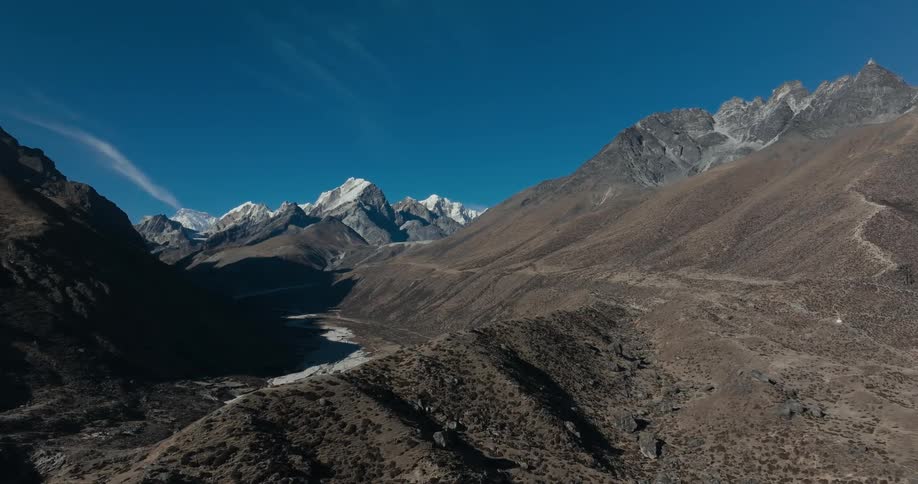 Landscape of a gray soil of mountains in winter