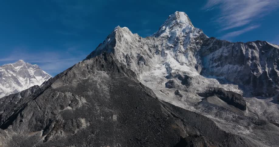 Landscape of mountain ranges with cliffs and snow