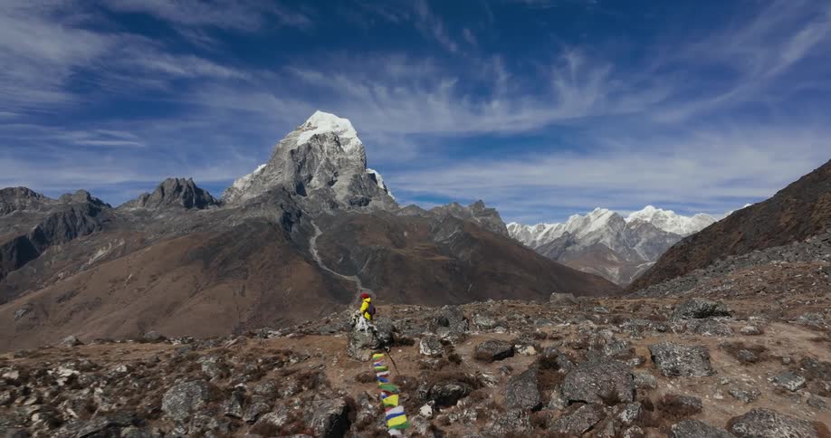 Man hiking in an environment with rocks and stones in the middle of mountains
