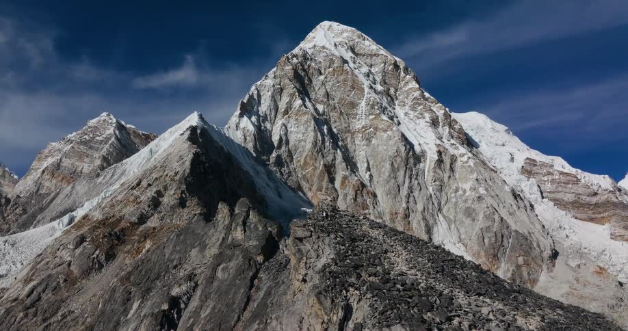 Mountain landscape with rocky peaks and cliffs covered by snow