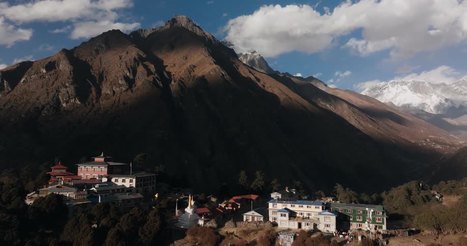 Village in the middle of mountains in daylight