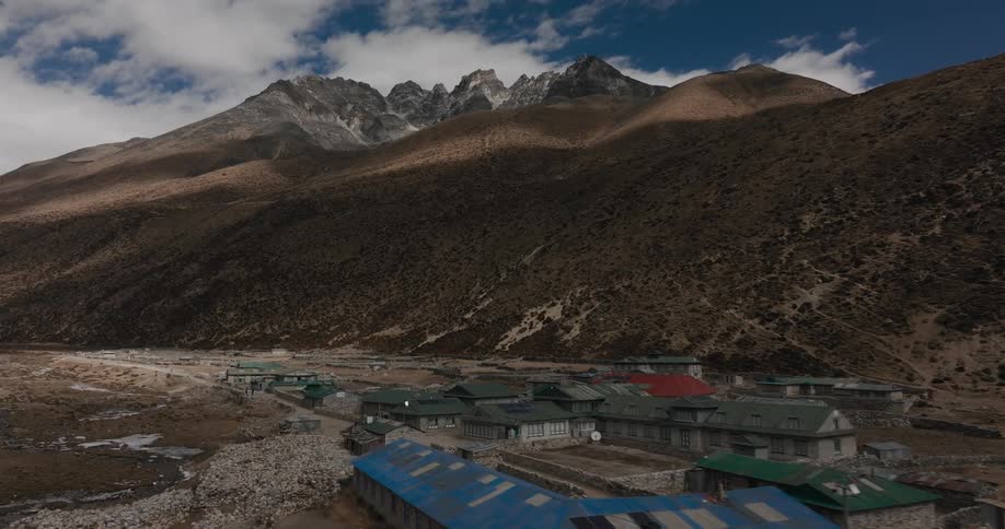 A small town built at the base of a large mountain