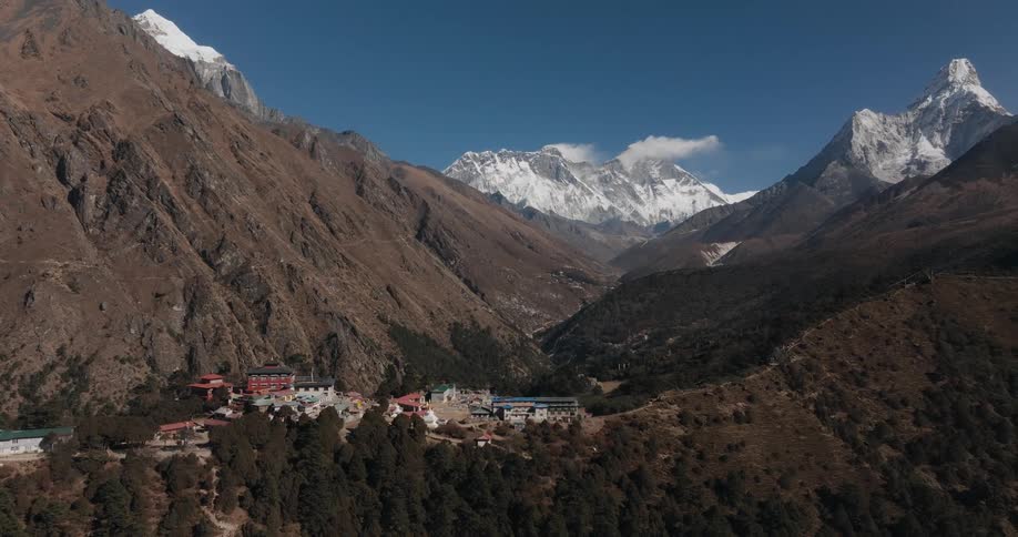 A civilization on top of a mountain during the day