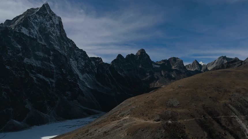 Rocky mountains landscape with peaks and with snow