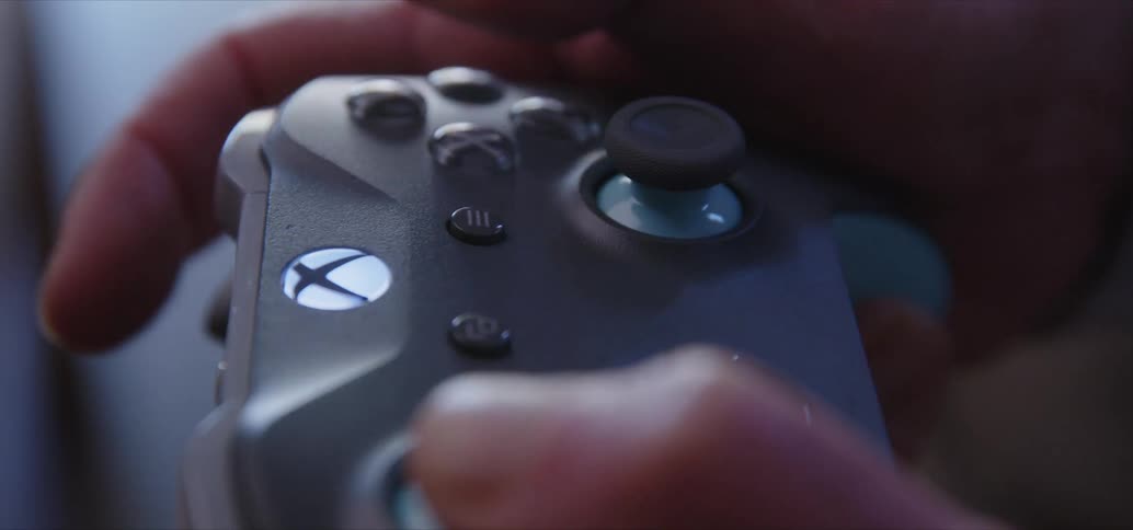 Hands using an xbox controller