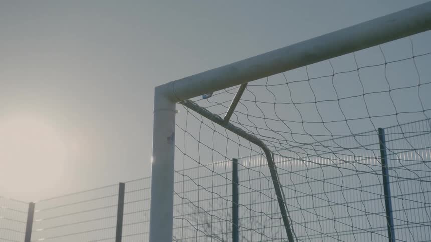 Topleft of a soccer goal post at daytime