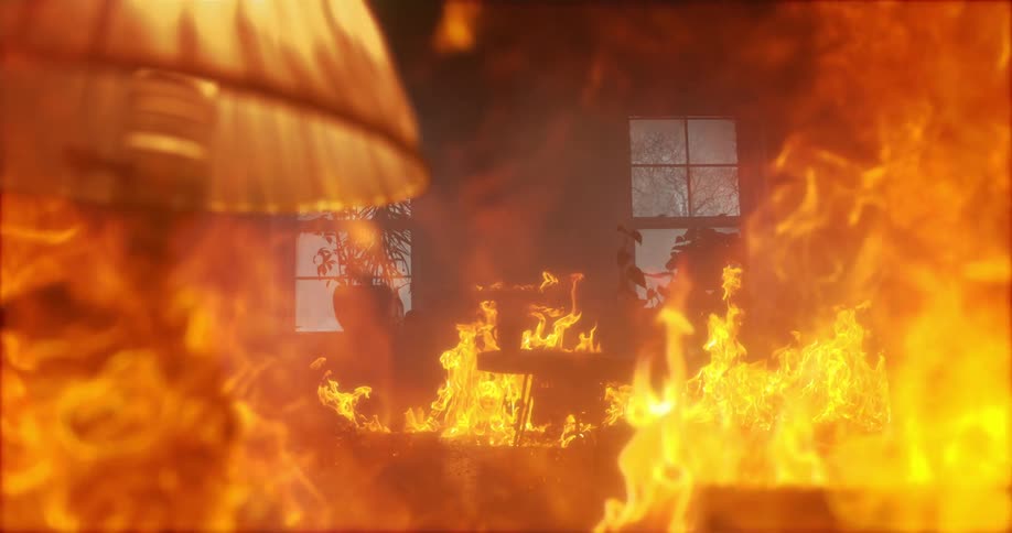 A living room engulfed in flames