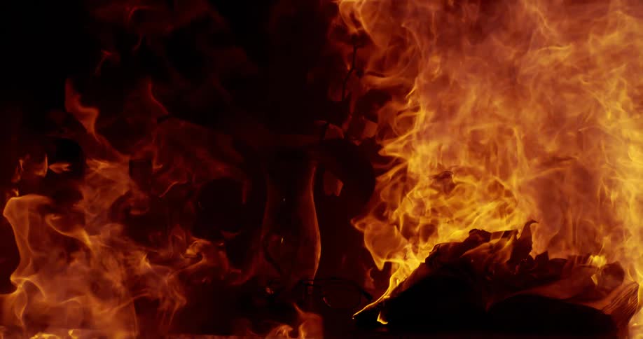 Large flames burn in a room