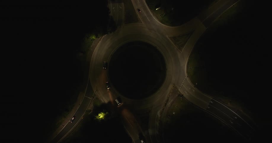 Cars crossing a roundabout